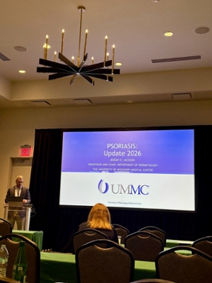 Jackson Speaking at symposium